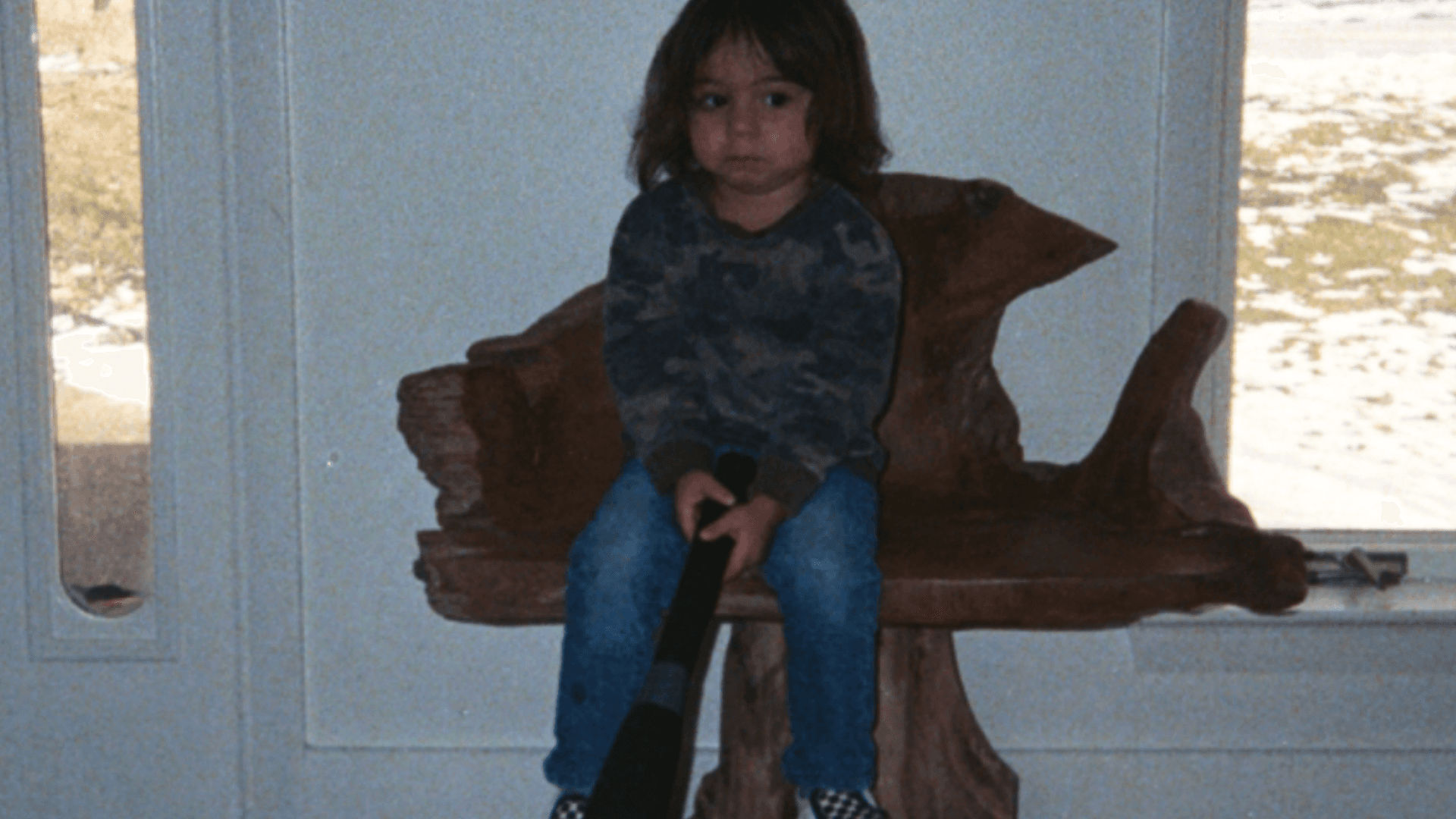 young boy looking bored