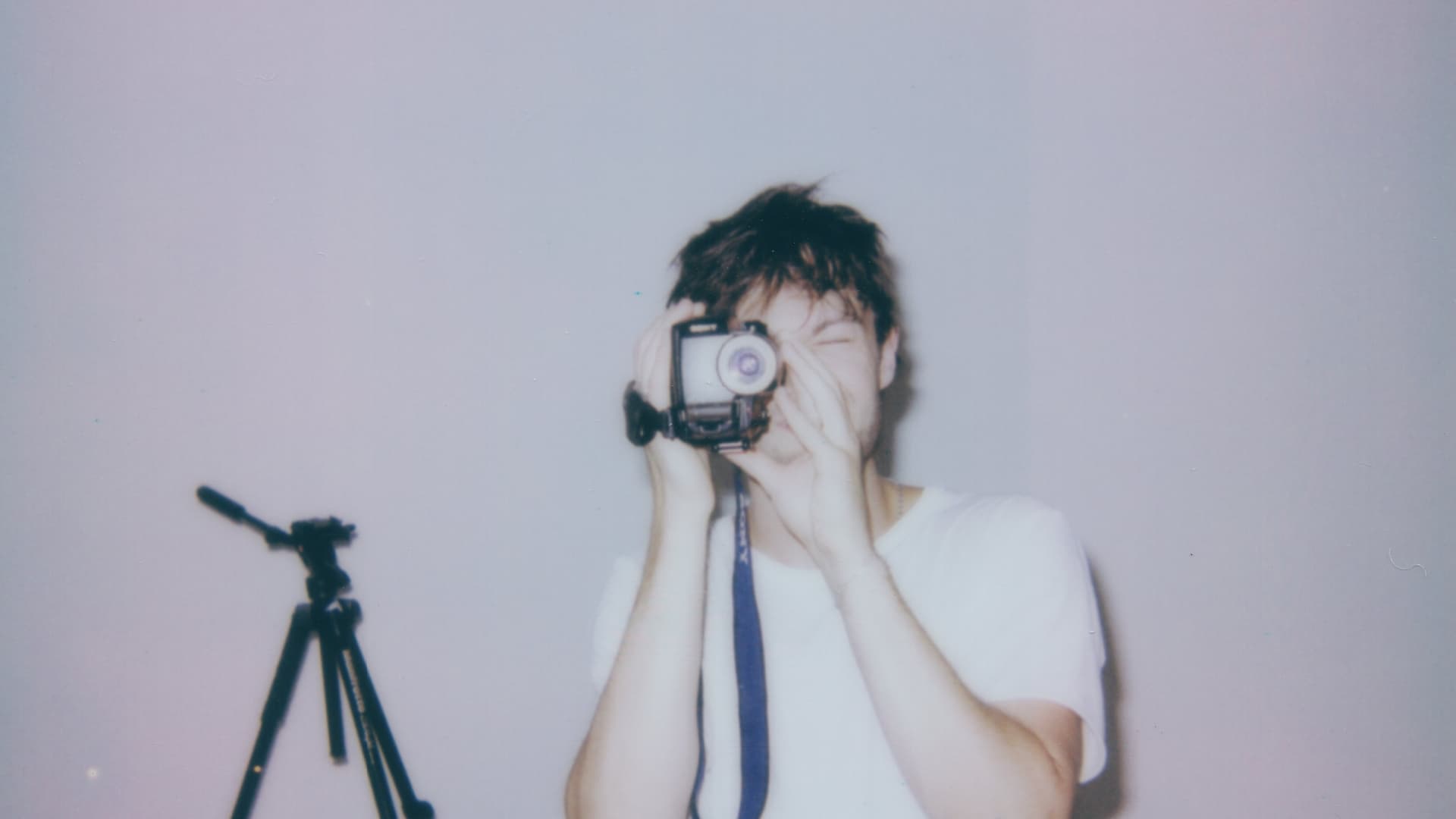 man holds camcorder